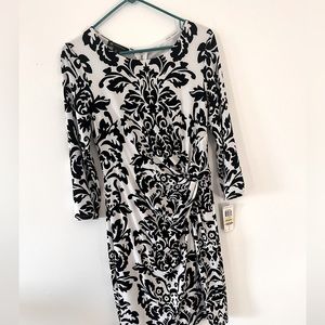 Black and white fitted dress.